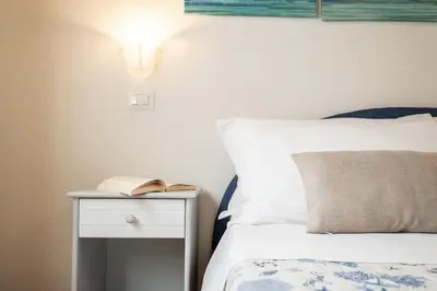Letto o letti in una camera di Sea Experiences 5 minuti dal mare- Ampia villa accessoriata