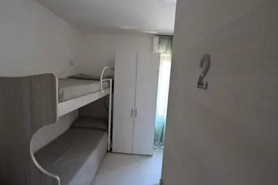 Letto o letti in una camera di Camere da Angelo