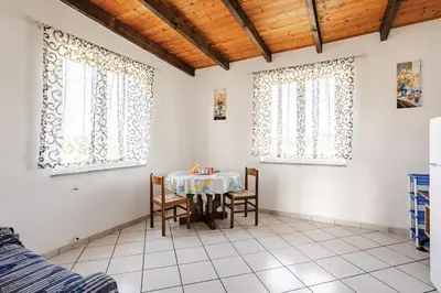 Area soggiorno di Tra Mare e Campagna - Cortile privato e relax