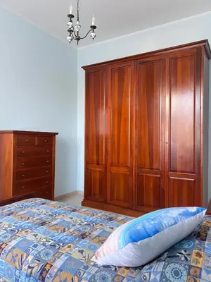 Letto o letti in una camera di Aurora House