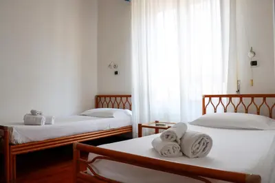 Letto o letti in una camera di Relax e Stile a Cagliari