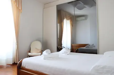 Letto o letti in una camera di Relax e Stile a Cagliari
