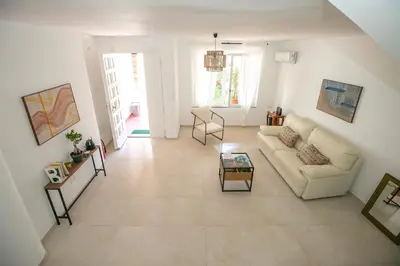 Area soggiorno di Guest House Emma's rooms