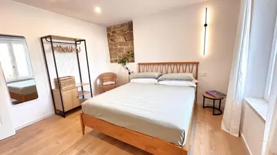 Letto o letti in una camera di Guest House Emma's rooms