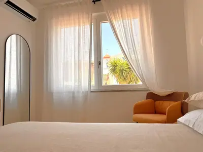 Letto o letti in una camera di Guest House Emma's rooms
