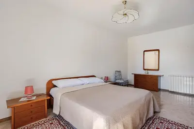 Letto o letti in una camera di Nel cuore di Cabras - Casa Laila