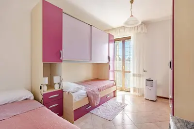 Letto o letti in una camera di Nel cuore di Cabras - Casa Laila