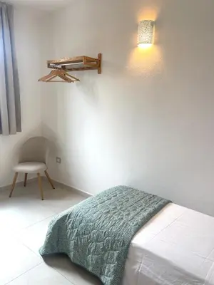 Letto o letti in una camera di Domus
