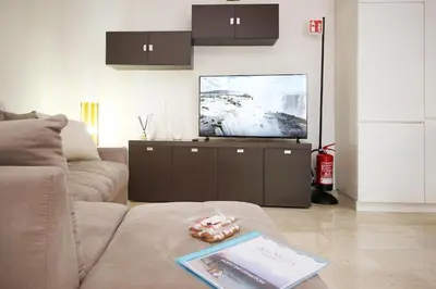 TV o dispositivi per l'intrattenimento presso Isma Luxury Stay - Sa Murta Apartments