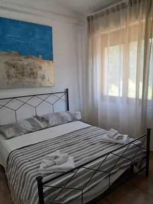 Letto o letti in una camera di Sa domu de su beciu mare