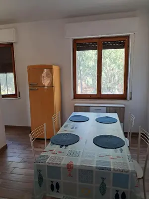 Letto o letti in una camera di Sa domu de su beciu mare