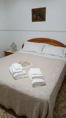 Letto o letti in una camera di Casa di Zia