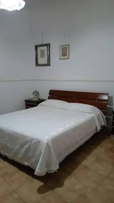 Letto o letti in una camera di Casa di Zia