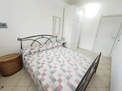 Letto o letti in una camera di Oasi Relax Casa Vacanze Sant'Antioco