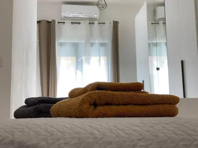 Letto o letti in una camera di Domus Gianni