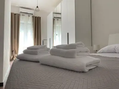 Letto o letti in una camera di Domus Gianni