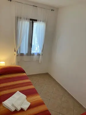 Letto o letti in una camera di Casa Melis