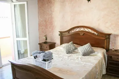 Letto o letti in una camera di Casa Mura