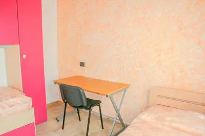 Letto o letti in una camera di Casa Mura
