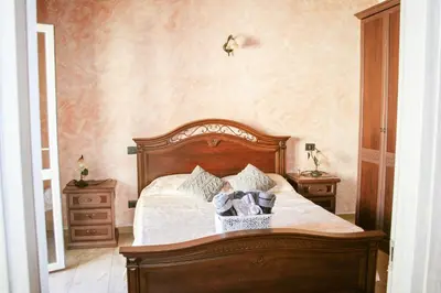 Letto o letti in una camera di Casa Mura