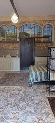 Letto o letti in una camera di Eremo degli Artisti