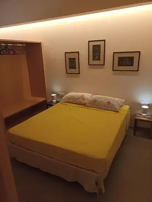 Letto o letti in una camera di Monolocale in centro vicino al parco Monte Urpinu