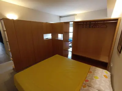 Letto o letti in una camera di Monolocale in centro vicino al parco Monte Urpinu