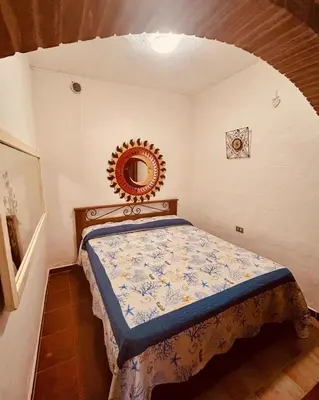 Letto o letti in una camera di Sotto Torre