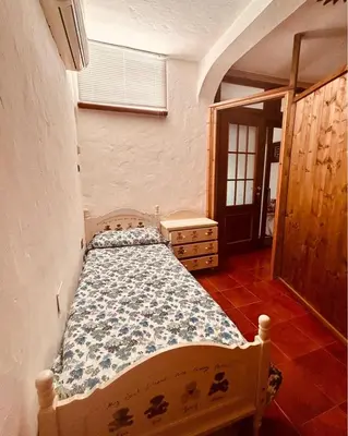 Letto o letti in una camera di Sotto Torre