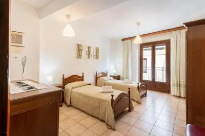 Letto o letti in una camera di Da Zia Vittoria - Affitti Brevi Italia