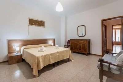 Letto o letti in una camera di Da Zia Vittoria - Affitti Brevi Italia