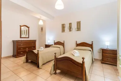 Letto o letti in una camera di Da Zia Vittoria - Affitti Brevi Italia