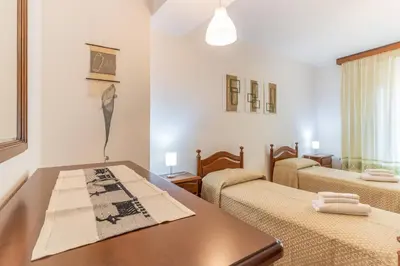 Letto o letti in una camera di Da Zia Vittoria - Affitti Brevi Italia