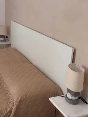 Letto o letti in una camera di Casa in centro Iglesias il tetto dei nonni Giannetta