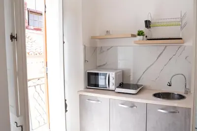 Cucina o angolo cottura di Casa in centro Iglesias il tetto dei nonni Giannetta