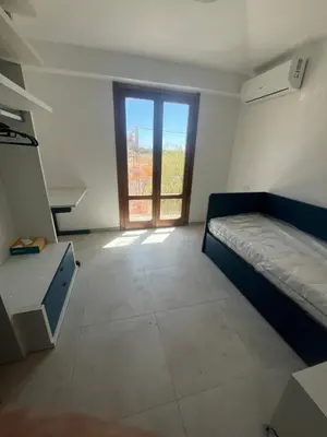 Letto o letti in una camera di NIDO D'AMOREcon vista mare
