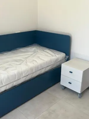Letto o letti in una camera di NIDO D'AMOREcon vista mare