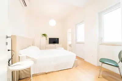 Letto o letti in una camera di Alberto's Suites Piazza Roma