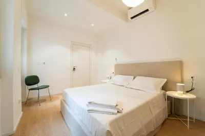 Letto o letti in una camera di Alberto's Suites Piazza Roma