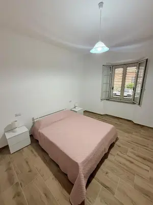 Letto o letti in una camera di Appartament Piras&Tascedda Barisardo Via CA
