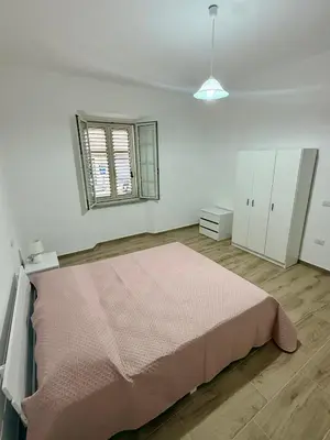 Letto o letti in una camera di Appartament Piras&Tascedda Barisardo Via CA
