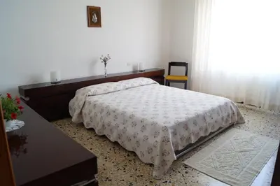 Letto o letti in una camera di Il Melograno