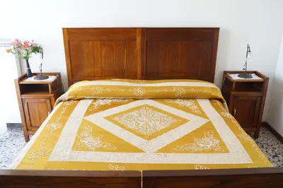 Letto o letti in una camera di Il Melograno