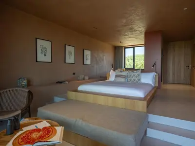 Letto o letti in una camera di Tenute Maestrale Wine Lodge