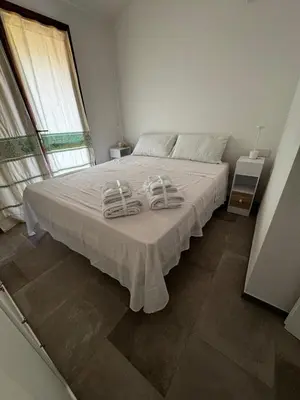 Letto o letti in una camera di Casa vacanze Solanas