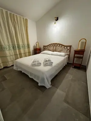 Letto o letti in una camera di Casa vacanze Solanas