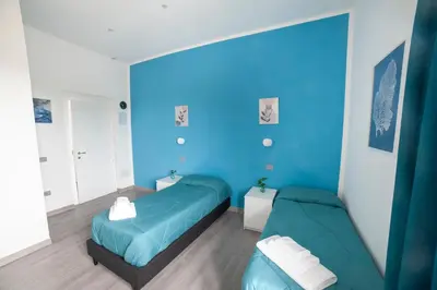 Letto o letti in una camera di Mhometredici Guest House