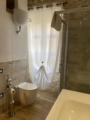 Bagno di Dani's House Holiday - Casa vacanza con vasca idromassaggio nel cuore di Cagliari