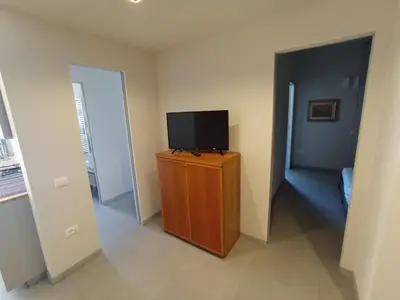 TV o dispositivi per l'intrattenimento presso Trilocale in centro vicino al parco Monte Urpinu