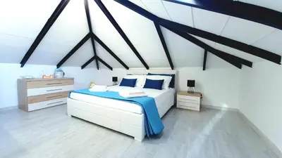 Letto o letti in una camera di Linda's House